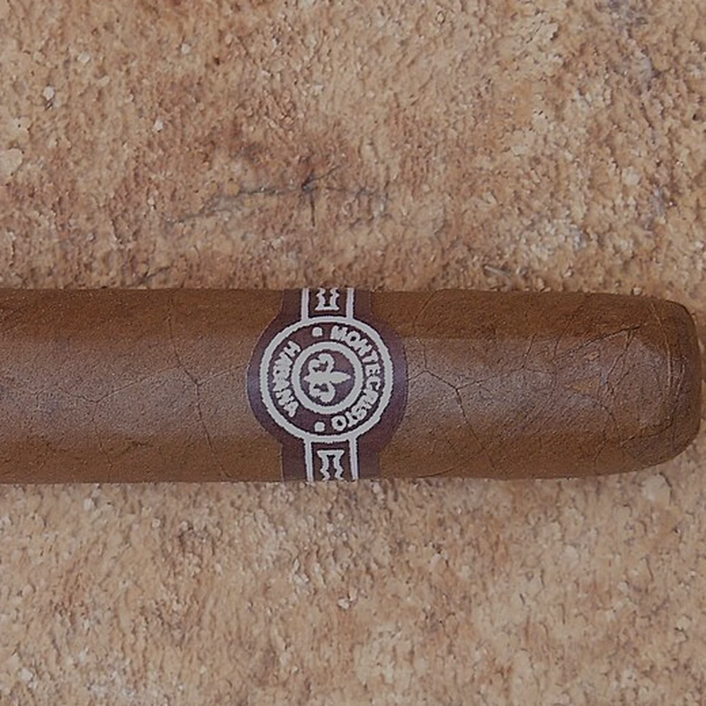 The band and wrapper of an unlit Montecristo No. 4 cigar